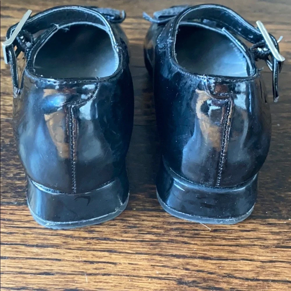 Patten leather Mary Jane dress shoes.